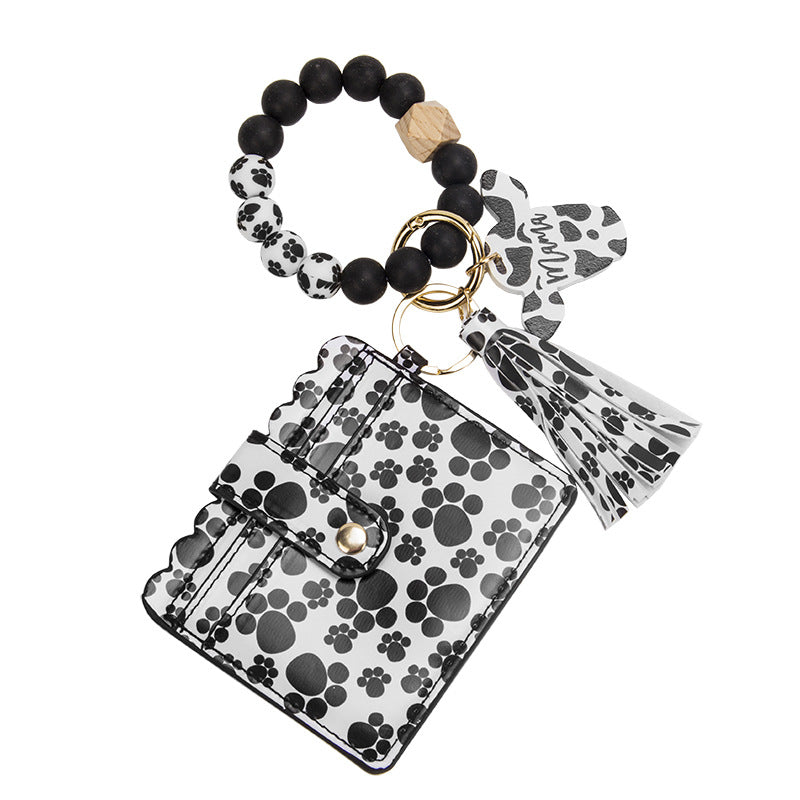 Venta al por mayor MAMA Cow Pattern Card Bag Silicona Beaded Wrist Key Chain